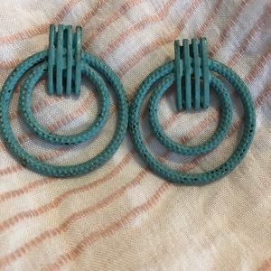 Turquoise colored earrings